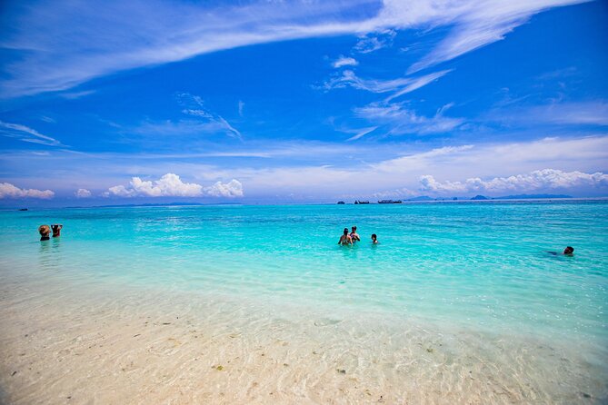 Bamboo Island and Phi Phi Island Full Day Tour From Phuket - Loh Samah Bay: white sand time and limestone drama