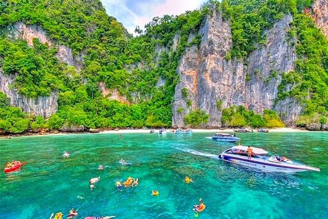 Explore Phi Phi, Maya Bay & Khai Island with Lunch from Phuket - Khai Nai Island: Fish-Feeding, Beach Swimming, and Relaxing Closer to the Shore