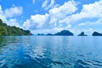 James Bond Island & Phang Nga Bay with Canoeing By Big Boat From Phuket - Phuket Pickup to Ao Po Pier: How the Day Gets You There