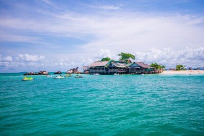 Khai Island Full Day Tour From Phuket - Koh Khai Nai (Stop 2): Snorkeling with coral and colorful fish, plus free island access