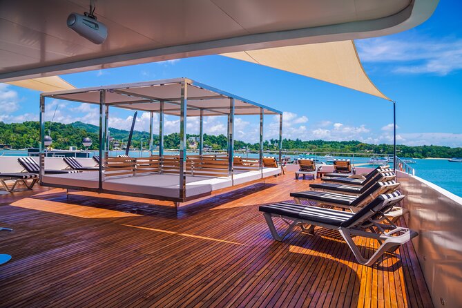 Luxury Boat to James Bond Islands with Lunch and Sunset Dinner - James Bond Island on Longtail Boat: Short Stop, Big Photo Goal