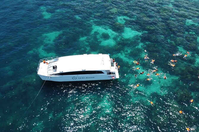 One Day Phi Phi, Maya And Khai Islands Adventure - Pileh Bay: the emerald-water swim with limestone cliffs