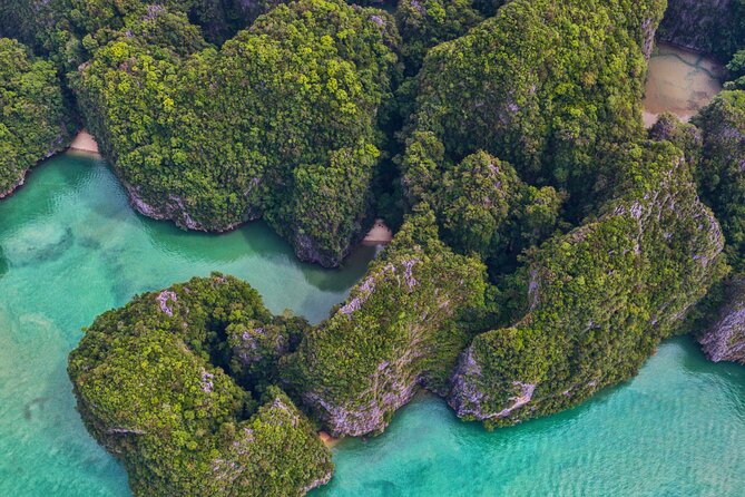 Phang Nga Bay Private Bioluminescence and Sea Canoeing Tour - Phanak Island (Monkey Island): caves, a big island shape, and monkey watching
