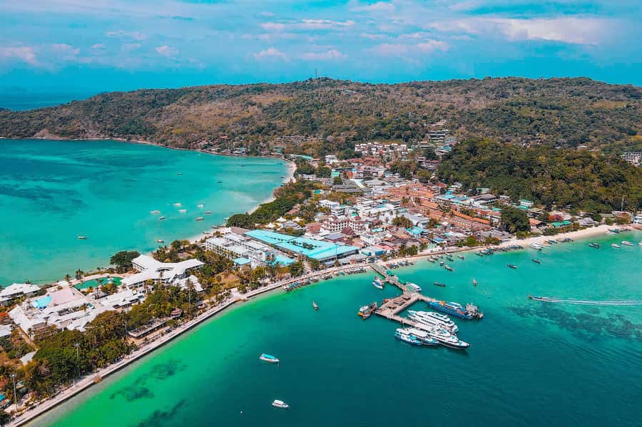 Phi Phi Island Highlights: Cruise, Snorkel & Buffet Lunch - From hotel pickup to the pier: how the day starts