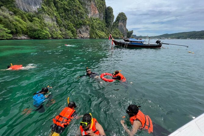 Phi Phi Islands Speedboat Full-Day Tour from Phuket+ Buffet Lunch - Monkey Beach: cute animals, real crowd energy