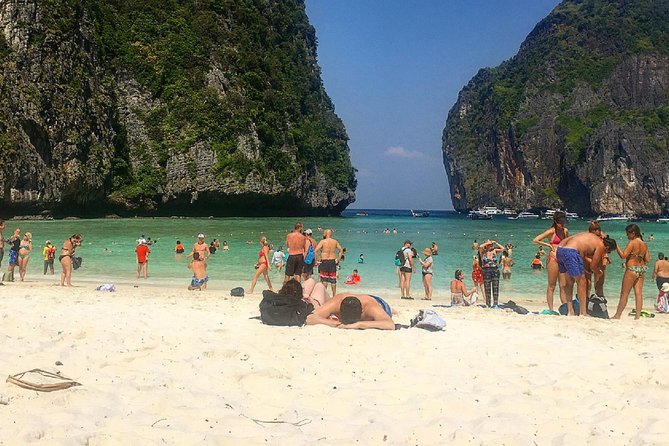 Phi Phi , Maya Bay & Khai Island snorkeling trip by Speed Boat - Koh Khai Nai: Beach Time, Optional Water Sports, and Toilet Reality
