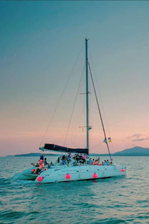 Phuket: Coral Island Catamaran Cruise with Sunset Dinner - Dinner onboard near sunset: Thai buffet, drinks, and the mood factor