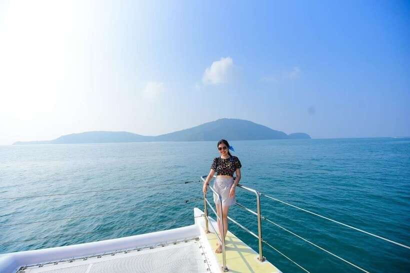 Phuket: Coral Yacht Boat Tour to Coral Island with Sunset - Pirates Beach: Your First Swim and Snorkel Break