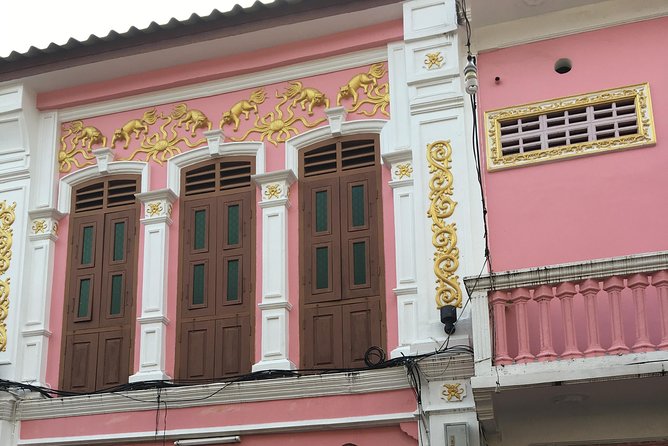 Phuket Night Street Food Walking Tour - The temple/shrine pause: culturally important, with dress rules