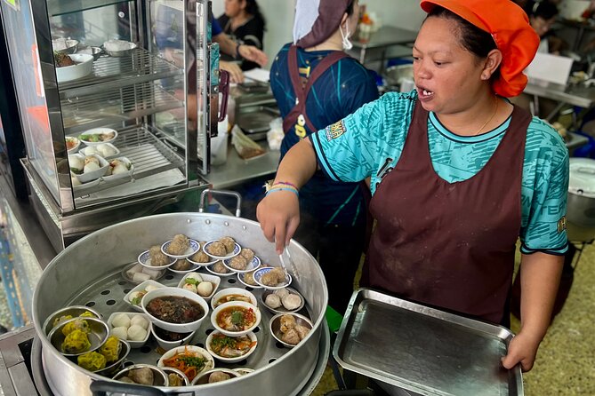 Phuket Old Town Food Tour with 10+ Locals' Favorites Tastings - Moo Hong Pork Belly and Charcoal Pancake: Two Classic Texture Lessons