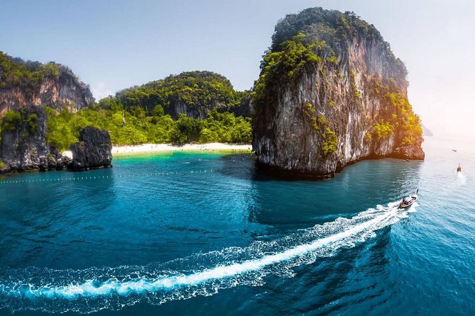 Phuket to James Bond Island: Longtail Boat Tour with Sea Canoeing - Phang Nga Bay national park stops: caves, limestone, and Talu area canoeing