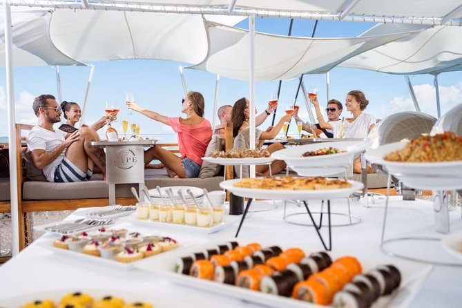 Phuket VIP Hype Luxury Boat Cruise with Party & DJ Vibes - Raya Yai Island (around 15:00): snorkeling and a second chance to swim