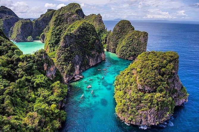 Private Phi Phi and Khai Islands Snorkeling Tour by Speedboat - Pileh Bay: the lagoon moment where the water becomes the attraction