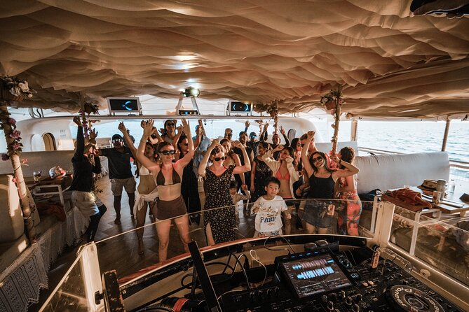 Rhapsody Phuket Coral & Racha Sunset Catamaran Cruise - Coral Island on a Luxury Catamaran: Beach Time, Water Toys, and Tradeoffs