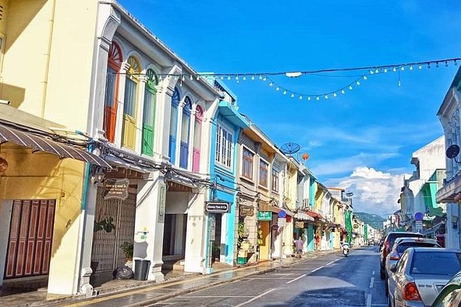 Travstore Original Phuket Discovery Tour - Shared Half Day City Tour - Transportation Comfort and Timing: AC Van, Real-World Delays
